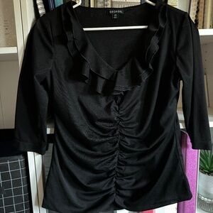 Black ruffle top with 3/4 length sleeves